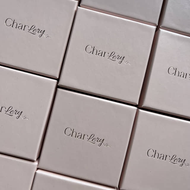 Charlery Sieradendoosje voor ringen kettingen armbanden en oorbellen in het lichtroze vierkant